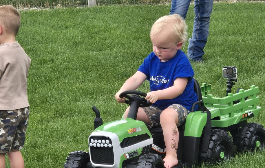 child on tractor